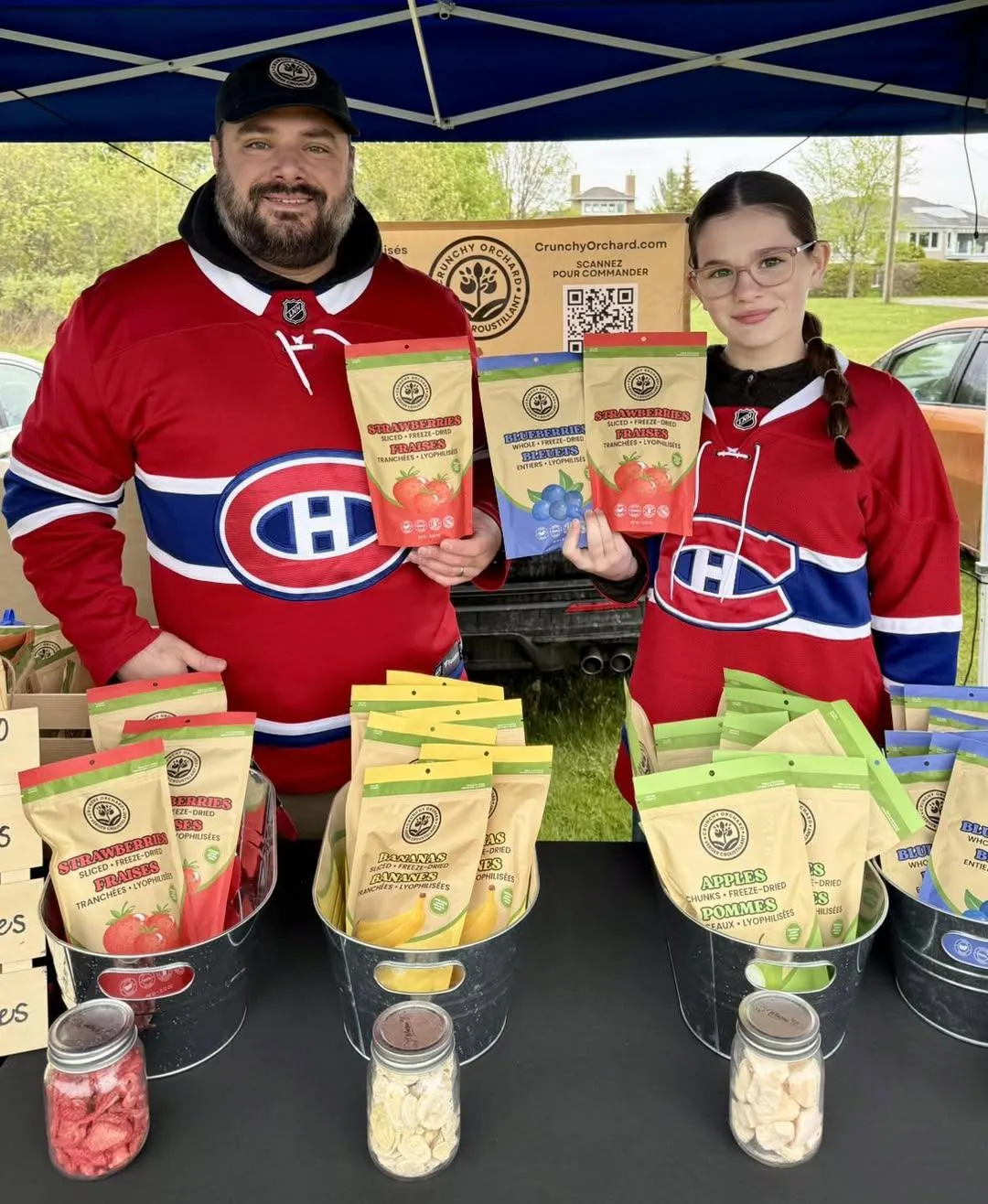 Patrick and his daughter Mahée at the Crunchy Orchard market stand