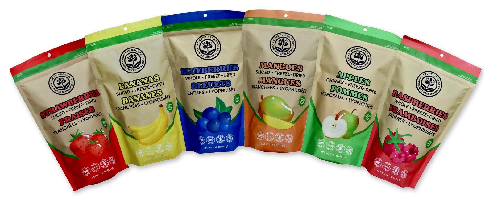 The six Crunchy Orchard freeze-dried fruit bags fanned out: strawberries, bananas, blueberries, mangoes, apples and raspberries